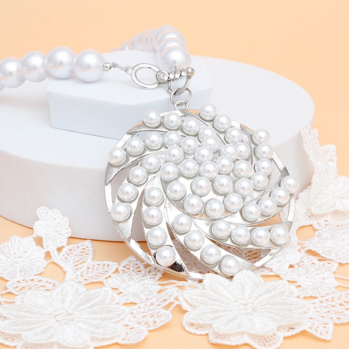Toggle Silver Swirled Circle Chunky Pearl Necklace